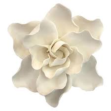 The style of art is symbolic of the same things that white flowers are symbolic of, including purity, perfection, peace and comfort. White Ceramic Flower Wall Art