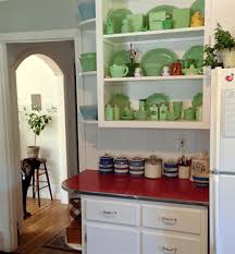 I kept original hardware and painted cabinets satin white. Is The Unkitchen Kitchen Design Trend Here To Stay Laurel Home