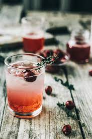 The holidays call for cocktails! Cranberry Ginger Bourbon Smash Dishing Up The Dirt