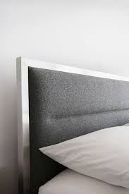 Gus Modern The Midway Bed Features An Upholstered Headboard And A Stainless Steel Perimeter F Bed Headboard Design Modern Bedroom Design Headboards For Beds