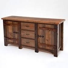 You'll also see wood cabinets, galvanized metal as well as stone or copper sinks. Rustic Bathroom Vanities Log Bathroom Vanities Rustic Barnwood Vanity