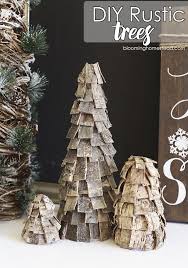 For this rustic christmas decoration i used red, blue, yellow, white, and black paint. Diy Rustic Trees Blooming Homestead Christmas Decorations Rustic Christmas Decor Diy Rustic Christmas Tree