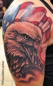 Flying eagle on ribs tattoos designs for men. Awesome Realistic Bald Eagle American Flag Tattoo On Shoulder By George Muecke