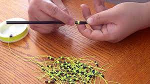 After attaching the bead, run the line through the slip bobber. How To Make A Slip Tie For A Slip Bobber Youtube