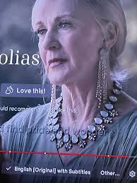 What is the information of the stunning necklace worn by Miss Paula