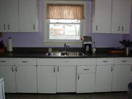 Outdated cabinets, countertops, and appliances made this kitchen an obvious candidate for a big. Vintage Metal Kitchen Metal Kitchen Cabinets Kitchen Cabinet Styles Kitchen Cabinets Models