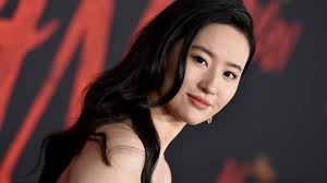 Reporters stood in the pouring rain to await her release before gathering round the journalist as she transferred to a. Agnes Chow Hong Kong Activist Hailed As The Real Mulan Bbc News