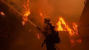 wildfires as tens of thousands evacuate ...