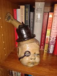 Weird baby head sculpture found in southern Illinois thrift store