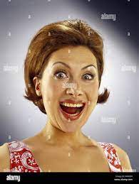 Woman facial play surprises portrait hi-res stock photography and images -  Alamy