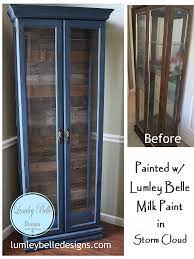 Choose a style that complements your room and furnishings, and add your own personal touch with custom paint and stain. Painted Curio Cabinet The Barn Wood Pallet Wood Reclaimed Wood Over The Back Mirro Painted Curio Cabinets Curio Cabinet Makeover Painting Curio Cabinet Ideas