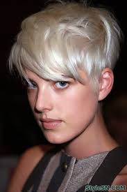 Her hair is an angled bob with curly side parting. Pin On Hair 2014 Short Hair 2014