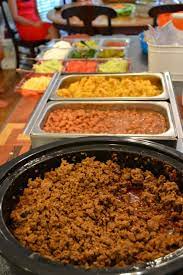 Host a taco party and enjoy! A Taco Bar The Easiest Way To Feed A Crowd Styleblueprint