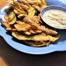 Deep Fried Potato Peelings Deep Fried Potatoes Peeling Potatoes How To Cook Potatoes