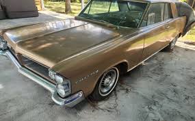 Image result for Caravan Gold 1963 Pontiac