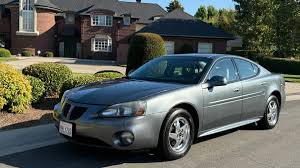 Image result for Dark Otter Gray 2004 Pontiac