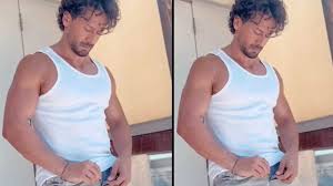 Tiger Shroff struggles to close the button of his jeans in the latest video