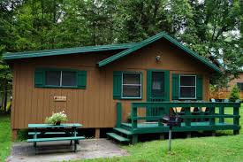 Extra large living room with dining table for 8. Book Blue Mountain Lake Lodge Adirondacks New York All Cabins