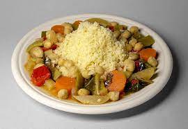An exotic moroccan couscous salad with chickpeas, raisins and colorful vegetables coated in a delicately spiced olive oil and lemon. Couscous Recipes Wiki Fandom