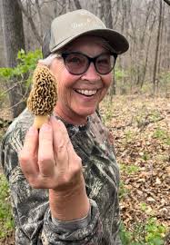 What are some effective ways to repel ticks while outdoors?