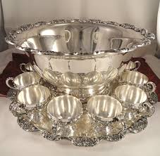 He plans to add at least 24 cups of fruit juice to the bowl before adding the ginger ale. Poole Lancaster Rose Silver Plate Vintage Punch Bowl Set With Under Tray 12 Cups Silver Tea Set Silver Decor Punch Bowl Set