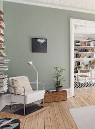 Sage Green Walls And A Rustic Knotty Floor This Room Echos The Sentiment Of Simplicity In Living Room Green Paint Colors For Living Room Living Room Colors