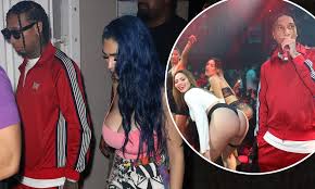 Tyga lets his hair down alongside his Kylie Jenner lookalike girlfriend at  Miami club | Daily Mail Online