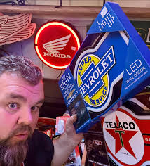 This 1960's Wayne 400 series gas pump is all about the chrome and overhang  top lights. It's a unique design that would have looked right at home in  the muscle car era