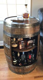 Whiskey Barrel Liquor Cabinet Handcrafted From A Reclaimed Whiskey Barrel Man Cave Home Bar Bars For Home Barrel Furniture