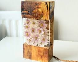 Brighten your bedroom and living space with this foye 30'' table lamp. Wood Resin Light Sculpture Reclaimed Antique Wood Outdoor Etsy Resin Crafts Wood Resin How To Antique Wood