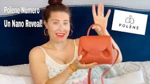 The exterior has a flat pocket and the interior also has a flat pocket. Polene Numero Un Nano Reveal Youtube