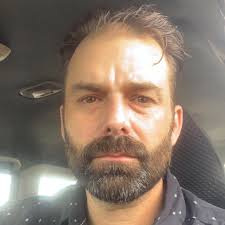 Why does my Audi TT Roadster's AC blow warm air after reaching normal  operating temperature?