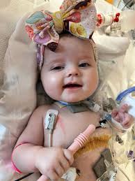 Please vote for MK. Born with a rare disease this contest brings awareness  to VACTERL association and if we won, helps cover many more surgery's for  her!