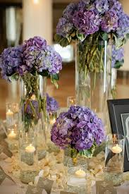 We selected gold, navy and sparkle (yes, sparkle is a color in my book) because these complemented the feeling we were going for as well. Ultra Violet Navy Gold Wedding Inspiration Hydrangea Centrepiece The Wedding Playbook