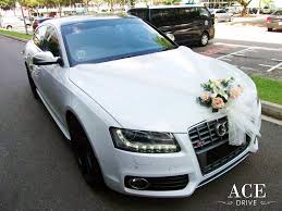 Whatever wedding car decoration styles you want, can be easily bought here. White Audi S5 Wedding Car Decorations By Ace Drive Car Rental