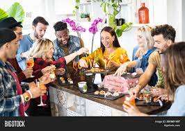 A cross between a cocktail party and a buffet dinner party, cocktail buffets are a good choice for the cocktail buffet should have plenty of food, so guests won't need to leave for dinner and can stay. Group Friends Having Image Photo Free Trial Bigstock