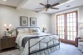 Joanna incorporated elements like arched openings, rustic furniture, earthy tones, and natural textures like stucco, stone, and wood into the home. Fixer Upper Master Bedrooms And Master Bathrooms Fixer Upper Welcome Home With Chip And Joanna Gaines Hgtv
