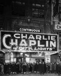People Flock To A Cinema To See City Lights The Latest Charlie Chaplin Film At The George M Cohan Theate Charlie Chaplin Chaplin Film Charles Spencer Chaplin