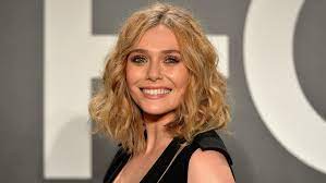 Elizabeth dazzled in a daring red sheer lace zuhair murad dress that showed off her stunning physique at the 33rd film independent spirit awards in los angeles on saturday. Why Elizabeth Olsen Considered Using A Different Last Name When She Started Acting Fox News