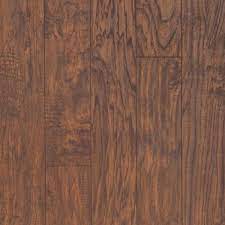 Laminate flooring is a multilayered synthetic hard surface made from recycled hardwood. Pergo Xp Hazelnut Hickory 8 Mm T X 5 23 In W X 47 24 In L Laminate Flooring 18 9 Sq Ft Case Lf001000 The Home Depot
