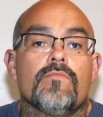 Roswell man charged with murdering another man in front of ex-girlfriend,  her children