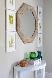 It measures 30'' h x 32'' l x 16.5'' d, and requires assembly upon arrival. Marble Top Half Moon Table With Reclaimed Wood Octagon Mirror Cottage Entrance Foyer