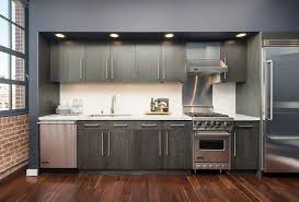 Single Wall Contemporary Kitchen With Dark Cabinets And Wood Floors In Brick Loft Kitchen Designs Layout Kitchen Design Small One Wall Kitchen