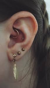 got my daith upgraded finally to a rose gold ring and i got my conch pierced guys just need to upgrade m conch piercing jewelry earings piercings ear jewelry