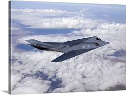 The surfaces and edge profiles are optimised to reflect hostile radar into narrow beam signals, directed away from the enemy radar detector. An F 117 Nighthawk Stealth Fighter In Flight Over New Mexico Wall Art Canvas Prints Framed Prints Wall Peels Great Big Canvas