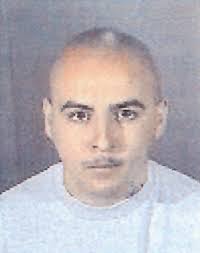 Suspect in shooting of deputy's mother surrenders