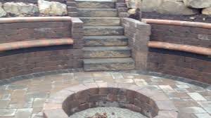 This area may be adjacent to an other outdoor living space, such as a living room. Gorgeous Waterfall And Sunken Fire Pit Youtube