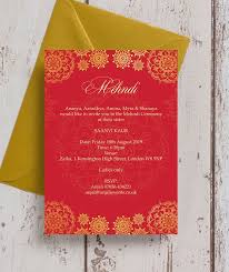 Indian weddings are a festival in itself. Red Gold Mehndi Baraat Card Asian Wedding Invitations Indian Wedding Invitations Personalised Wedding Invitations