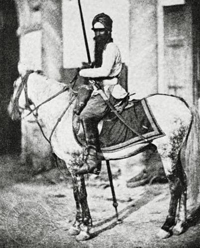 1857-58, Lucknow. Risaldar Man Singh of Hodson's Horse, Punjab Irregular Cavalry photographed at the Mermaid Gate, Lucknow. Photographer unknown. Digitally restored image from the East India Company and Raj Research Group Collection.