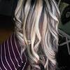 Straighten out your hair to showcase the seamless blending of the warm tones in all its glory. 1